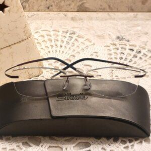 SILHOUETTE EYEGLASSES FRAMES 7581 40 6062 TITAN RIMLESS FLEX ARMS AUSTRIA & CASE